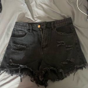 Black ripped shorts